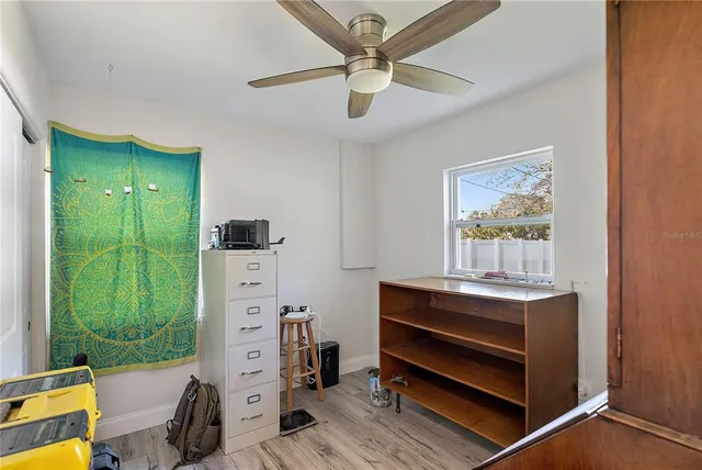 a room with furniture and a window