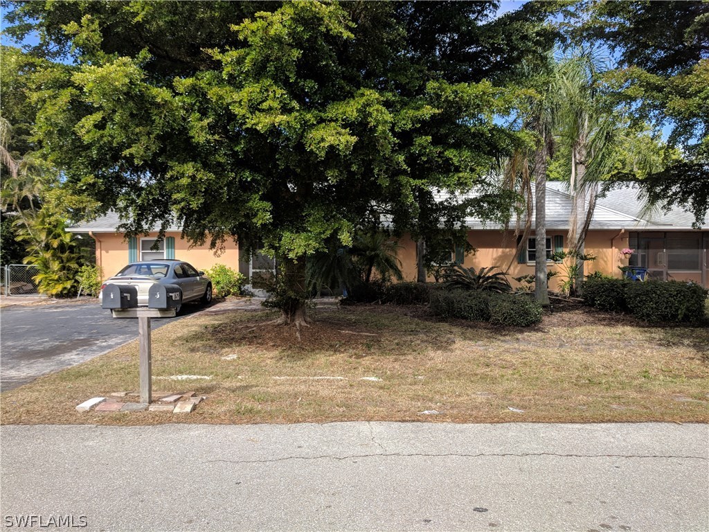 7263 Barragan Road, Unit 3 Fort Myers, FL 33967 - Photo 1 of 11 a street view along with residential houses
