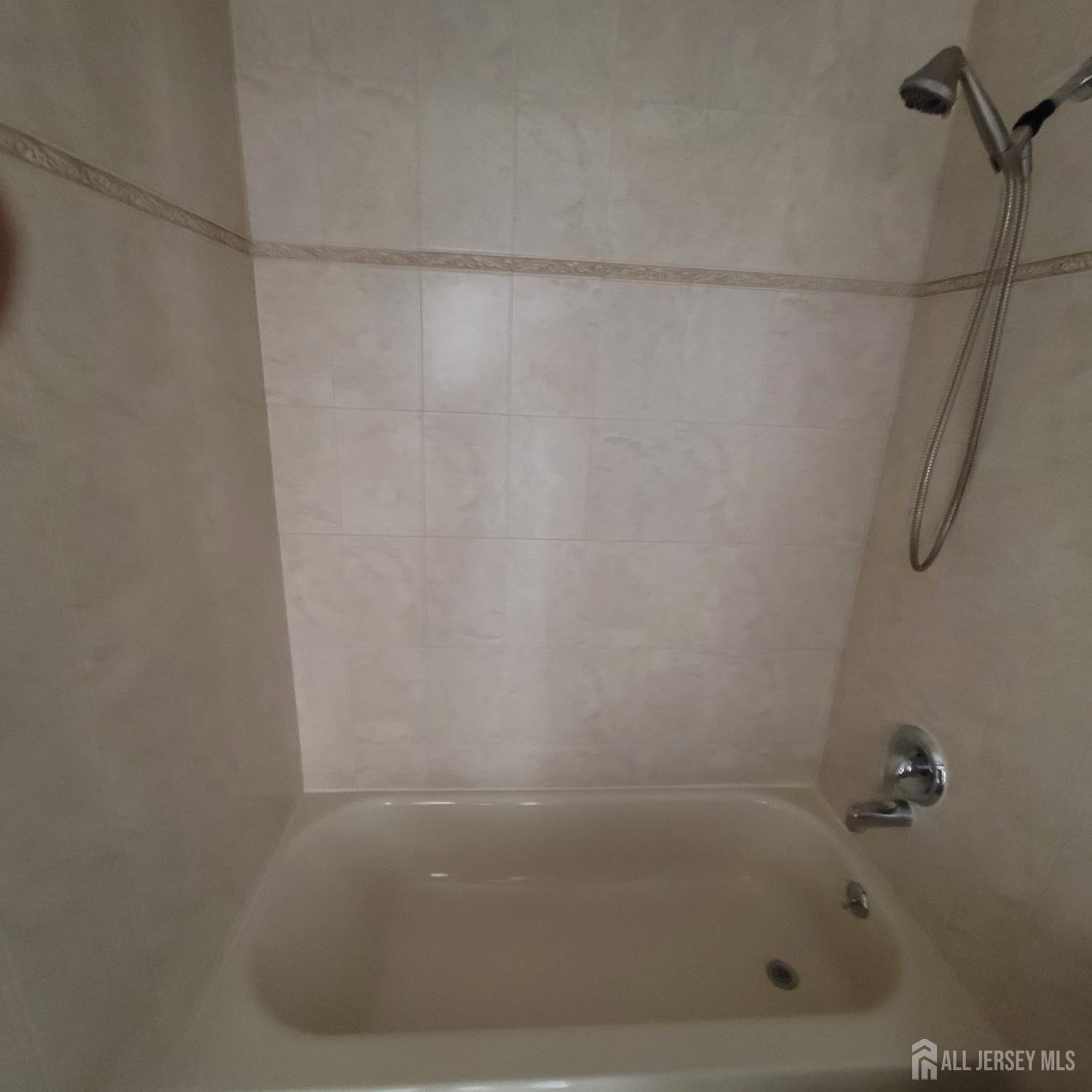 1617 Raspberry Court Edison, NJ 08817 - Photo 12 of 15 a close up of a bathtub