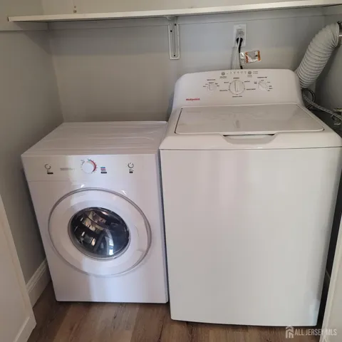 a utility room with dryer and washer