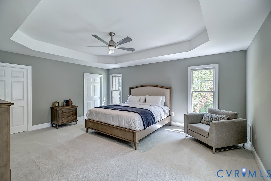 5 Red Fox Road Manakin-Sabot, VA 23103 - Photo 19 of 46 1st floor primary bedroom featuring tray ceiling,