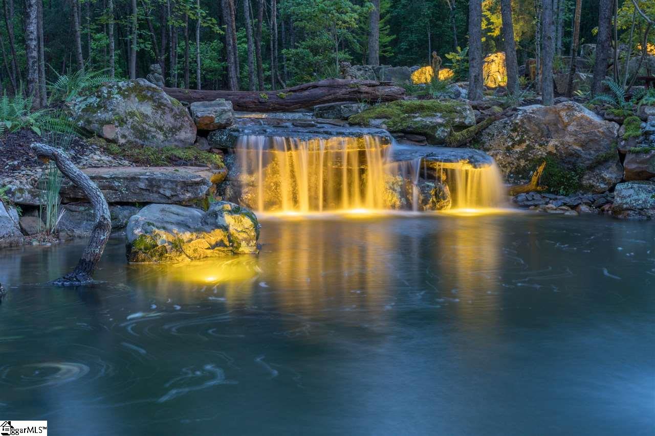 160 Forestville Road Travelers Rest, SC 29690 - Photo 5 of 36 All water features have underwater and landscape lighting.