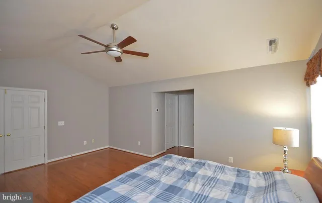 a bathroom with a tub and sink