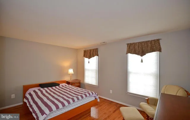 a bathroom with a mirror and a sink