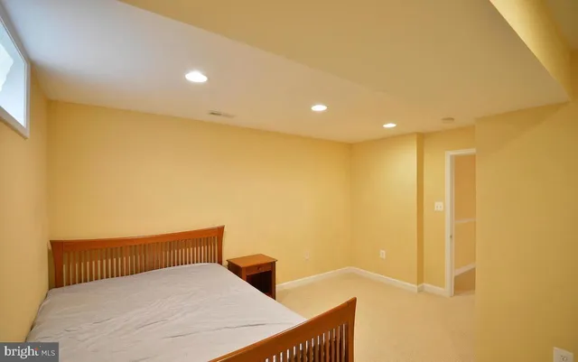 a bathroom with a toilet sink and shower