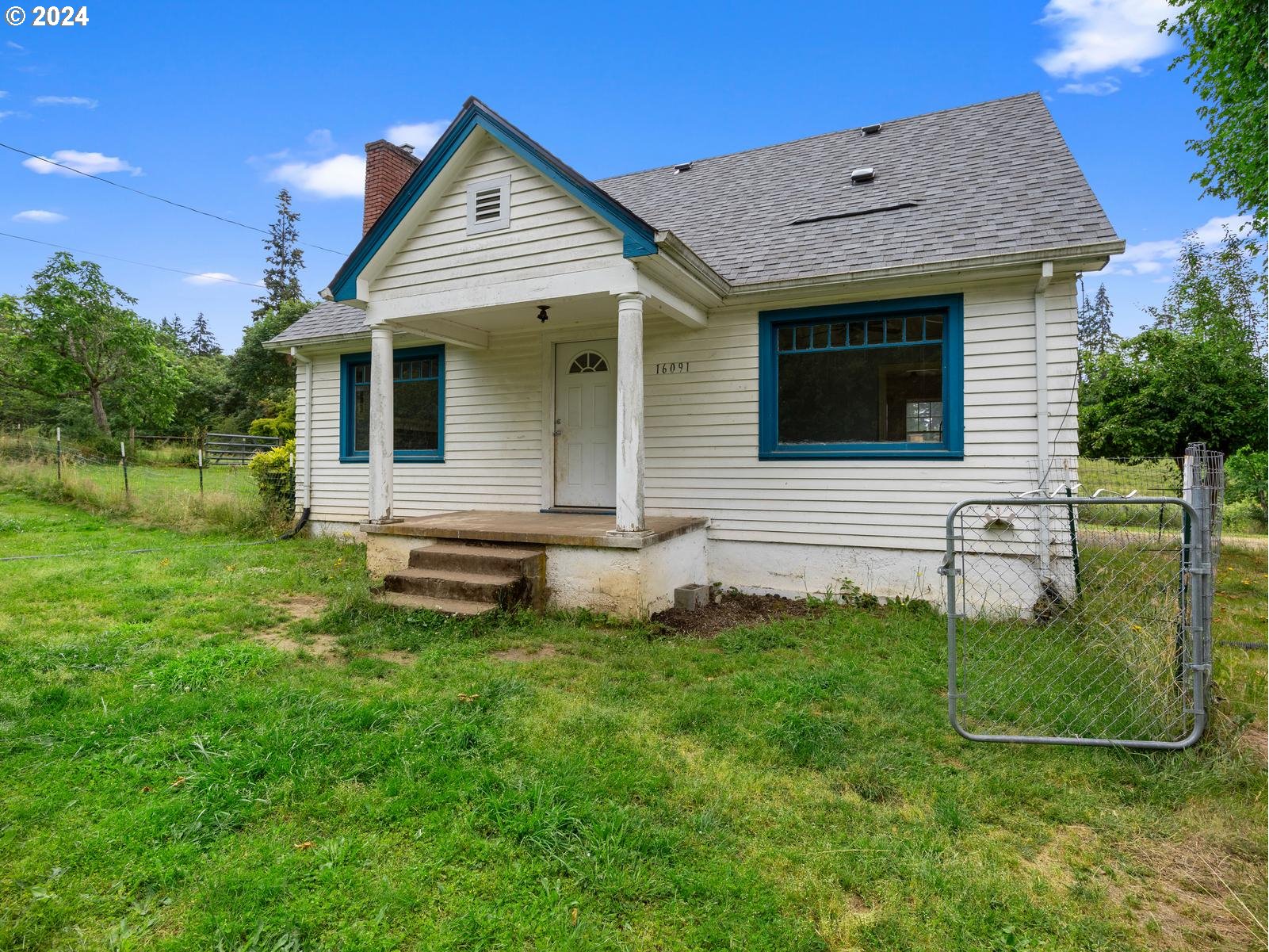 16091 Southeast Royer Road Damascus, OR 97089 - Photo 2 of 41 a view of a house with a backyard
