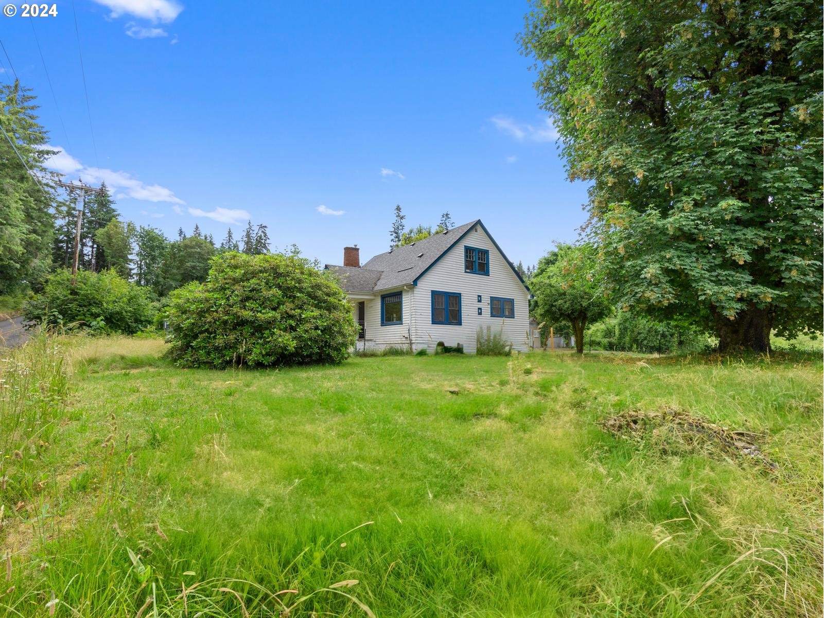 16091 Southeast Royer Road Damascus, OR 97089 - Photo 33 of 41 a view of a house with garden