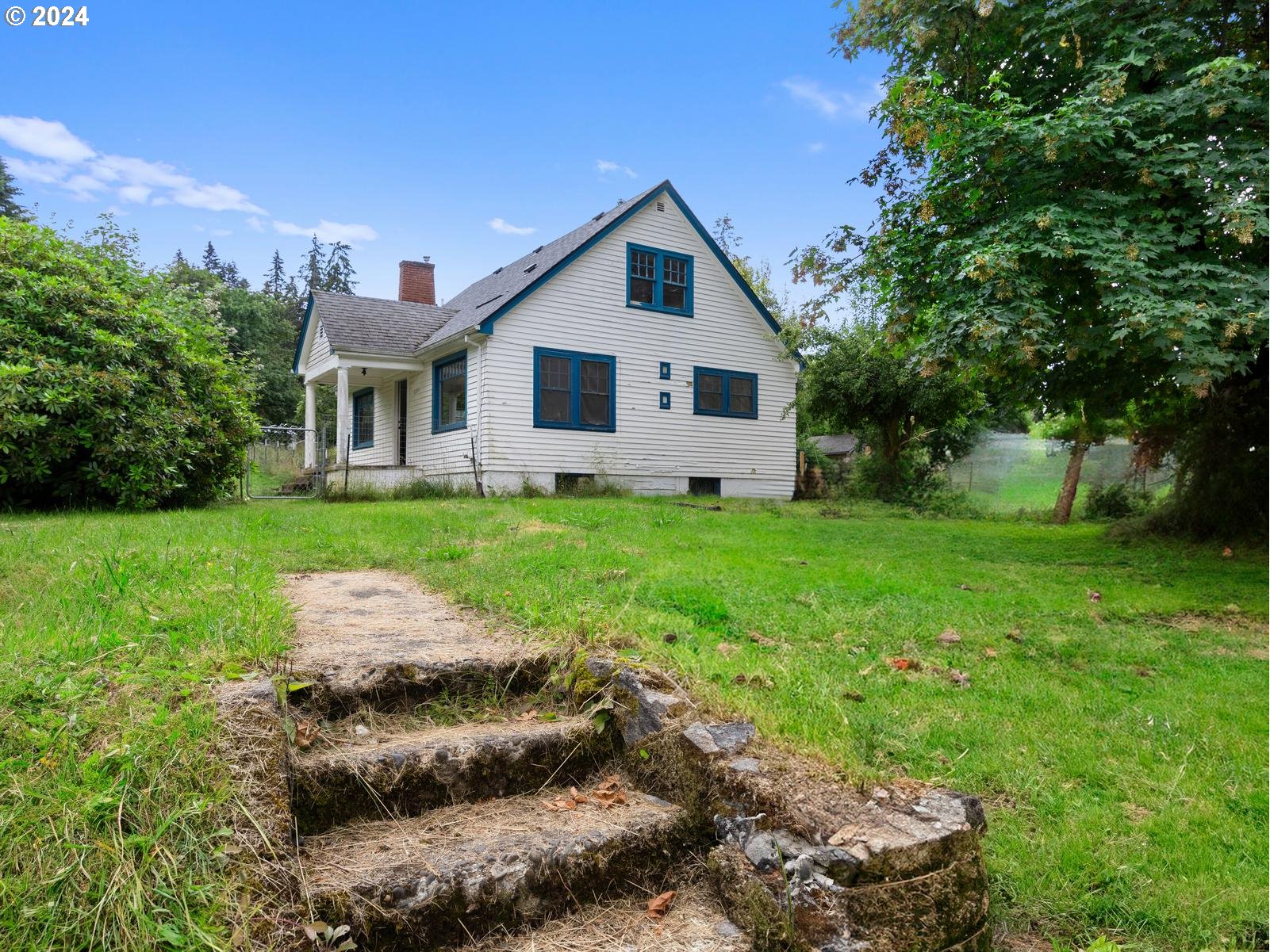16091 Southeast Royer Road Damascus, OR 97089 - Photo 36 of 41 a front view of house with yard and green space