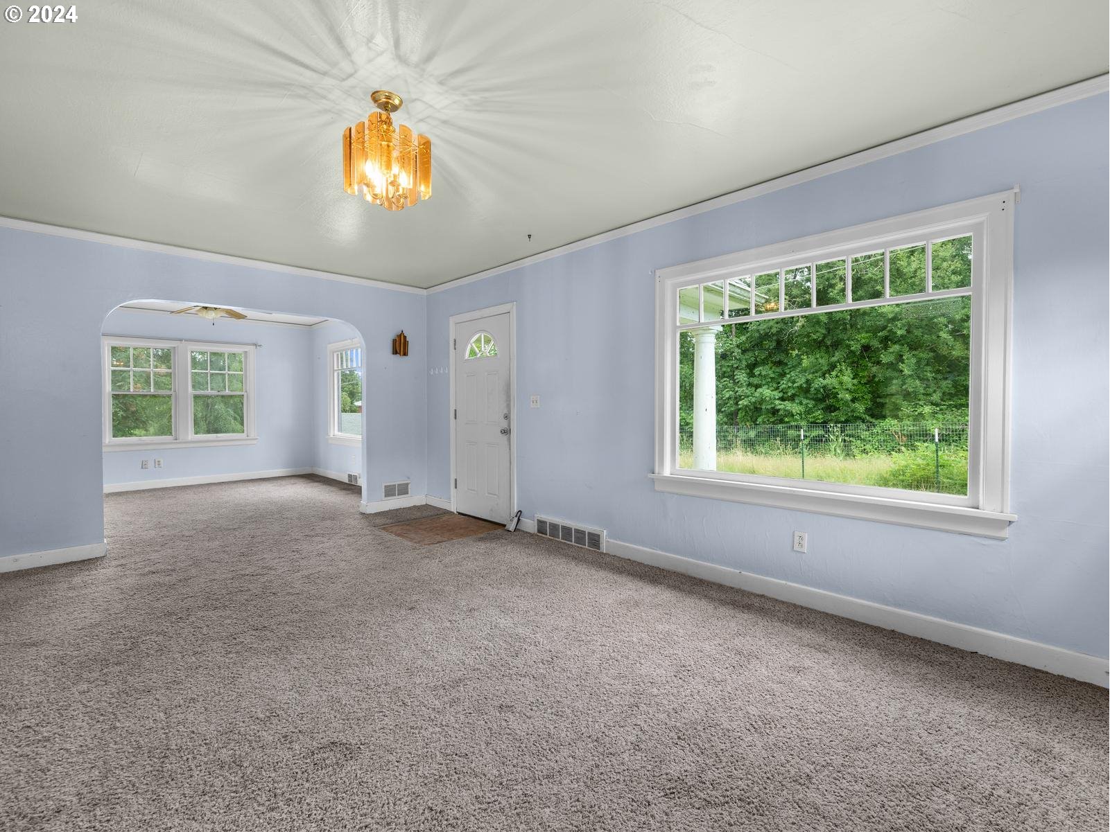 16091 Southeast Royer Road Damascus, OR 97089 - Photo 4 of 41 a view of an empty room with a window