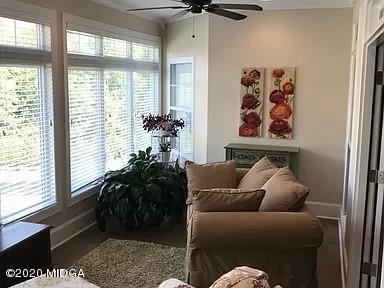 9743 Lower Thomaston Road Macon, GA 31220 - Photo 12 of 28 a living room with furniture and a potted plant