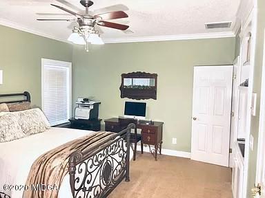 9743 Lower Thomaston Road Macon, GA 31220 - Photo 21 of 28 a bedroom with a bed and a chandelier