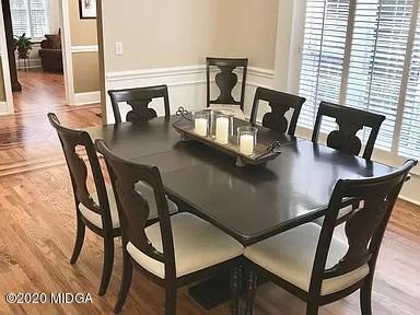 9743 Lower Thomaston Road Macon, GA 31220 - Photo 4 of 28 a view of a dining room with furniture and window