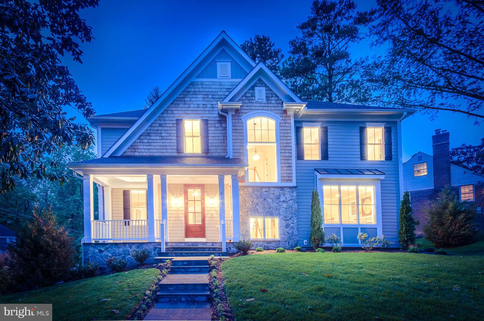 8700 Melwood Road Bethesda, MD 20817 - Photo 13 of 13 a front view of a house with garden