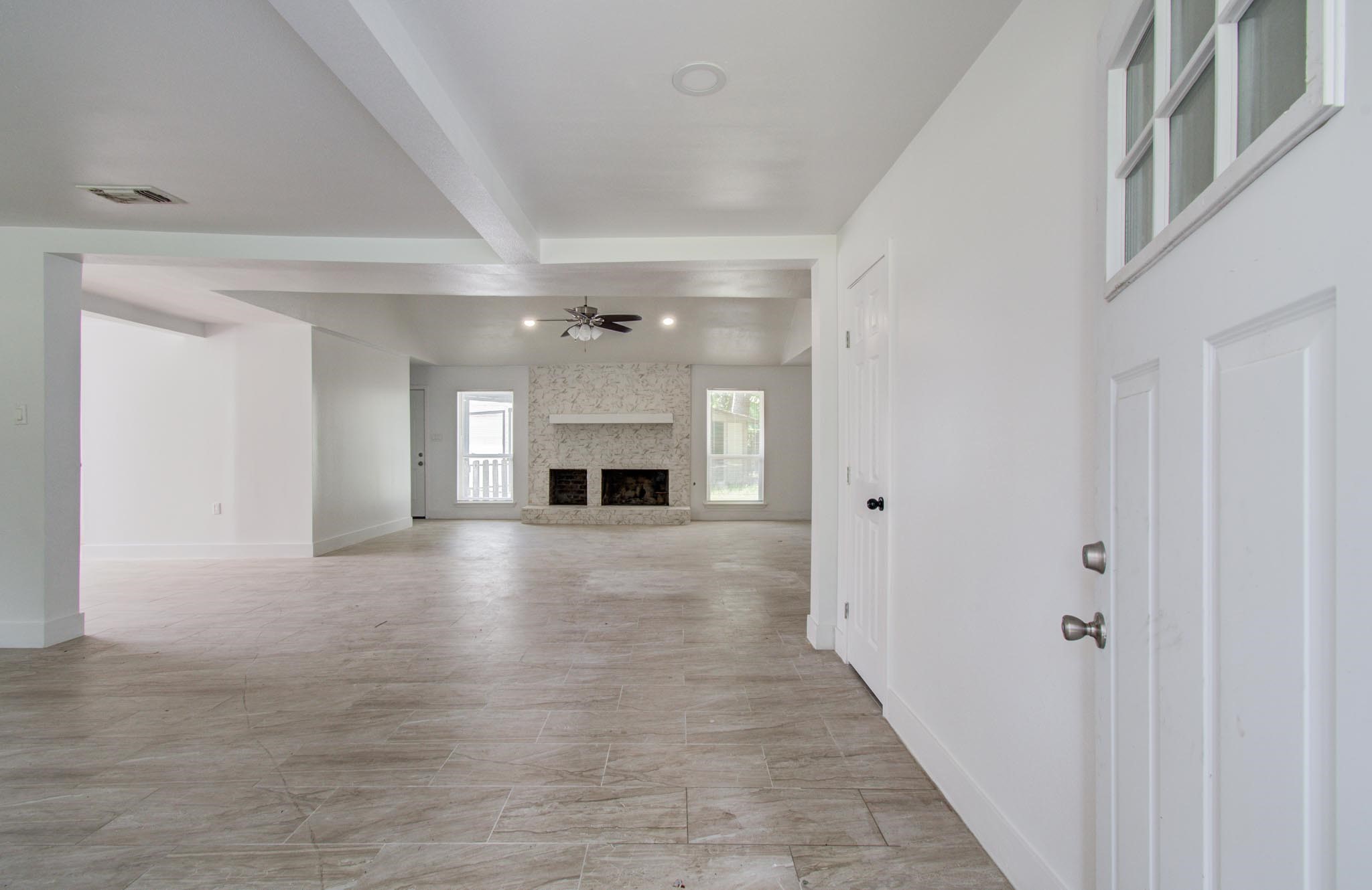 494 Brandon Road Conroe, TX 77302 - Photo 3 of 22 a view of empty room with a fireplace