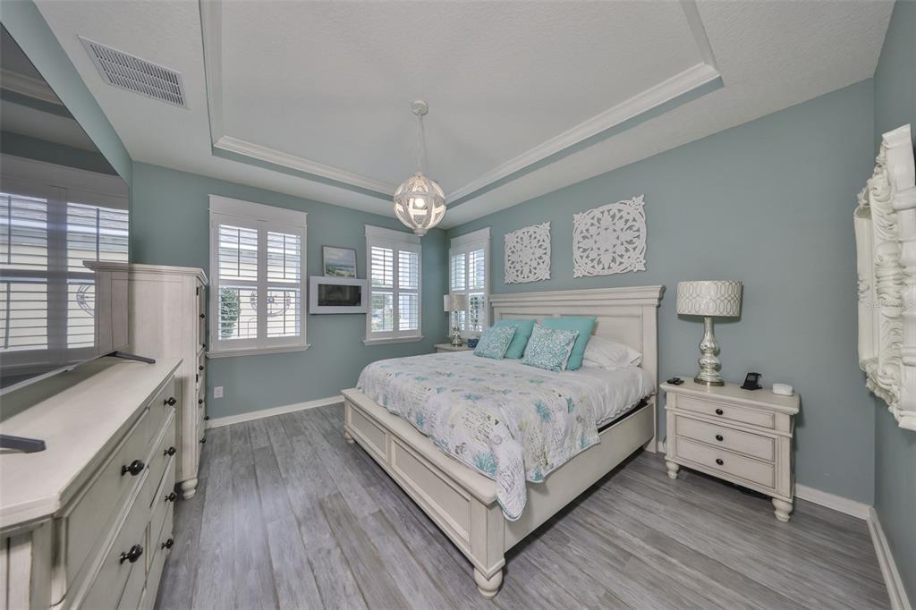 511 Winterside Drive Apollo Beach, FL 33572 - Photo 12 of 72 a bedroom with a bed and a large window