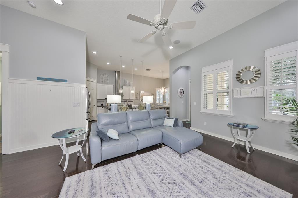 511 Winterside Drive Apollo Beach, FL 33572 - Photo 15 of 72 a living room with furniture and a chandelier