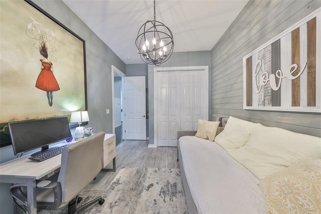 511 Winterside Drive Apollo Beach, FL 33572 - Photo 17 of 72 a living room with furniture and a flat screen tv