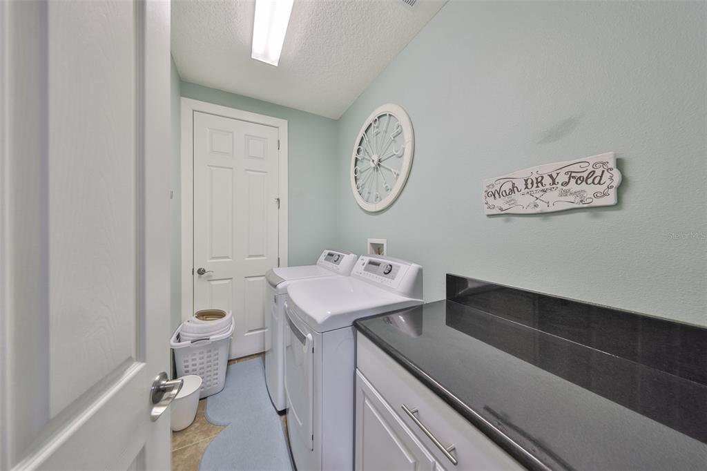 511 Winterside Drive Apollo Beach, FL 33572 - Photo 18 of 72 a bathroom with a sink and a toilet