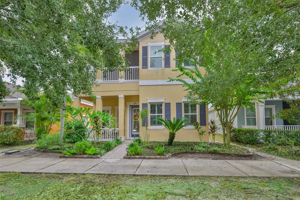 511 Winterside Drive Apollo Beach, FL 33572 - Photo 2 of 74 a front view of a house with garden