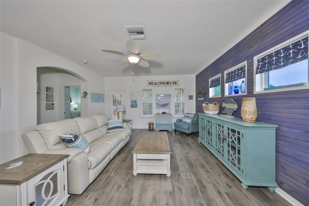 511 Winterside Drive Apollo Beach, FL 33572 - Photo 22 of 72 a living room with furniture and wooden floor