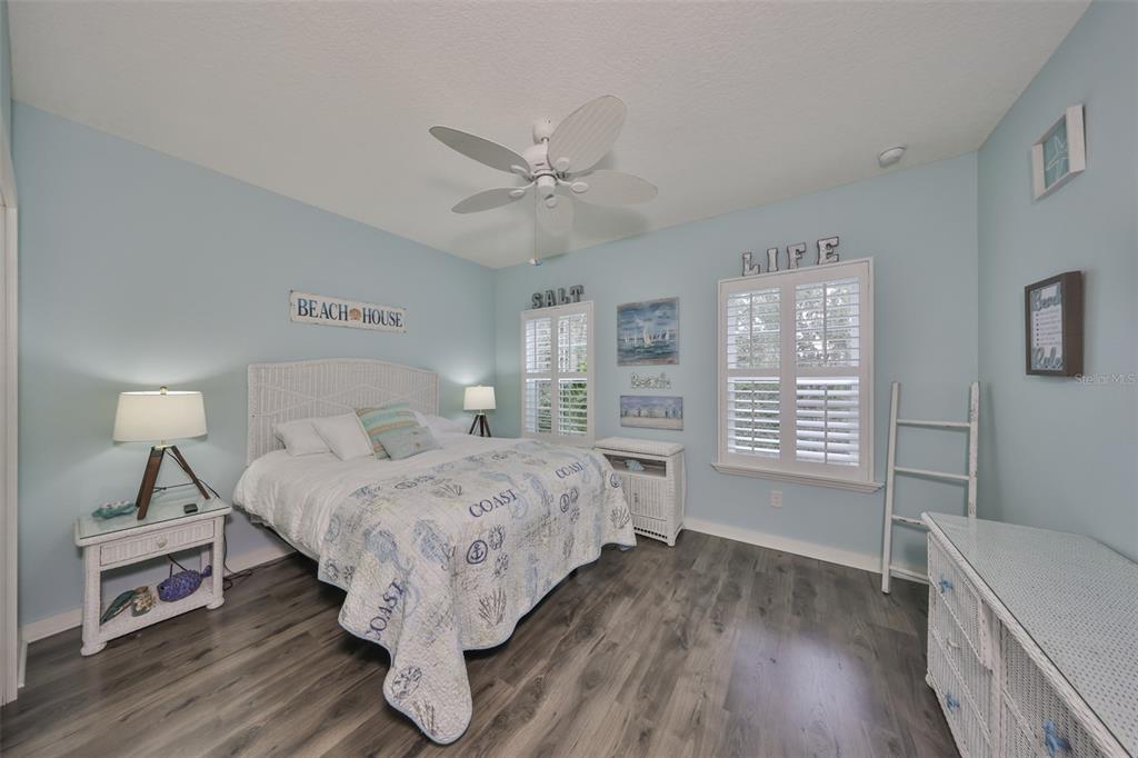 511 Winterside Drive Apollo Beach, FL 33572 - Photo 28 of 72 a bed sitting in a bedroom next to a window