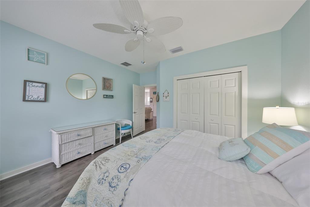 511 Winterside Drive Apollo Beach, FL 33572 - Photo 33 of 74 a bedroom with a bed and a dresser