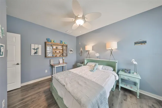 a view of residential house with outdoor space and lake