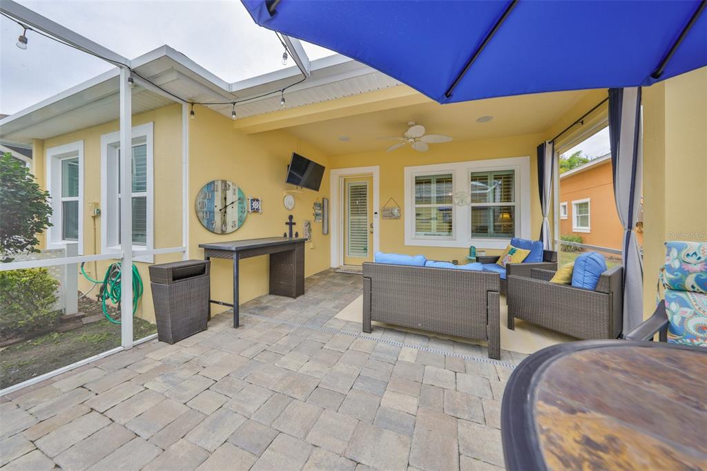 511 Winterside Drive Apollo Beach, FL 33572 - Photo 36 of 72 a view of a house with a barbeque grill and glass door