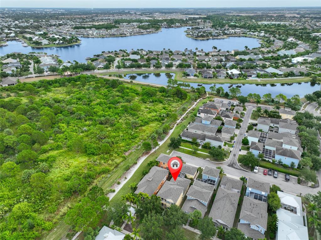 511 Winterside Drive Apollo Beach, FL 33572 - Photo 40 of 72 an aerial view of residential houses with outdoor space and river