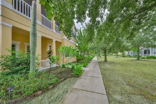 a view of a balcony with lake view and a floor to ceiling window