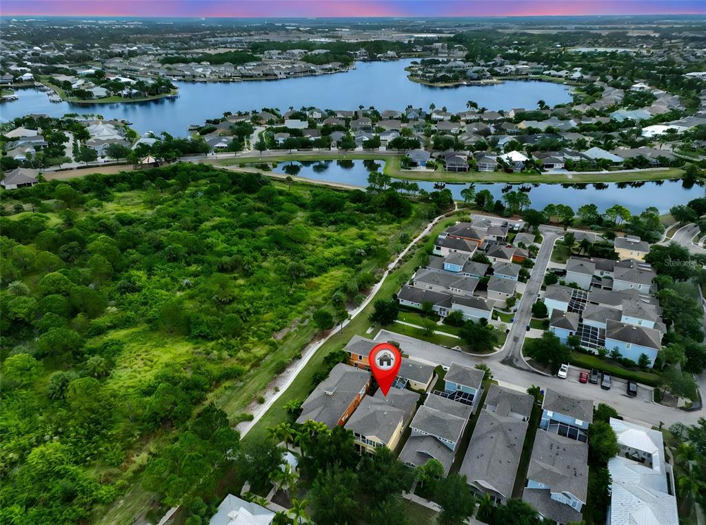 511 Winterside Drive Apollo Beach, FL 33572 - Photo 45 of 74 an aerial view of residential houses with outdoor space and river