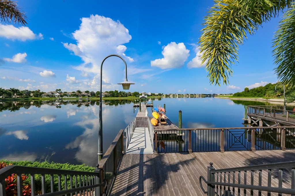 511 Winterside Drive Apollo Beach, FL 33572 - Photo 59 of 74 a view of a balcony with lake view and a floor to ceiling window