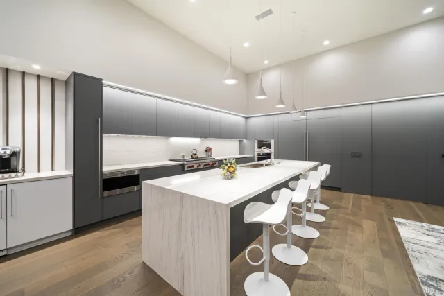 a view of an outdoor living room with a floor to ceiling window and floor to ceiling window