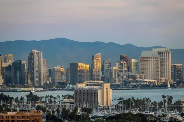 a view of a city with tall buildings