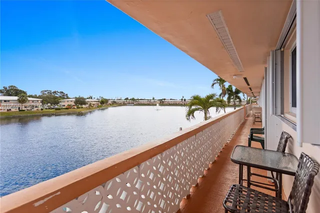 a view of a living room and dining room