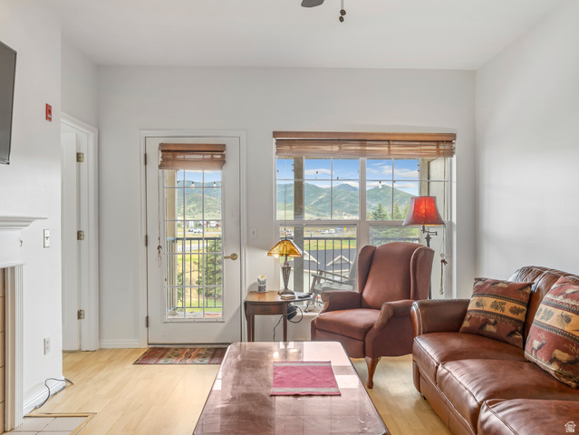 900 Bitner Road, Unit O33 Park City, UT 84098 - Photo 4 of 18 Bright living space featuring light wood-finish flooring and white walls