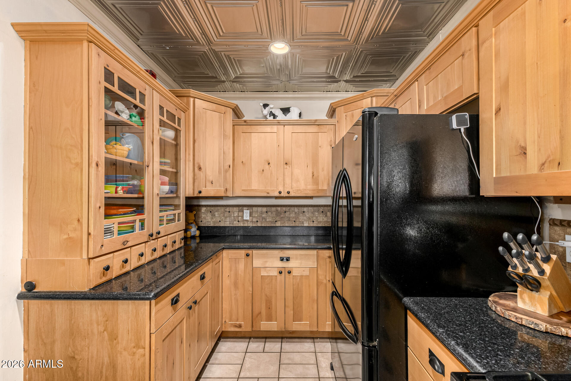 334 West Roma Avenue Phoenix, AZ 85013 - Photo 19 of 51 a kitchen with granite countertop a refrigerator and a sink