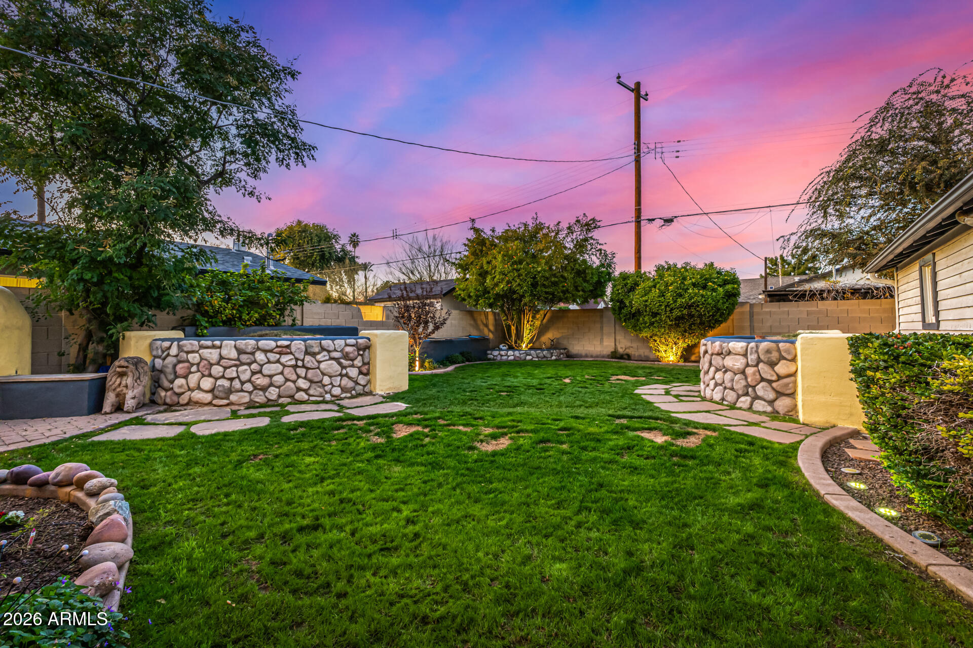 334 West Roma Avenue Phoenix, AZ 85013 - Photo 28 of 51 a view of a back yard of the house and a bench