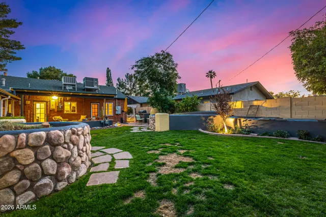 a view of a house with a big yard