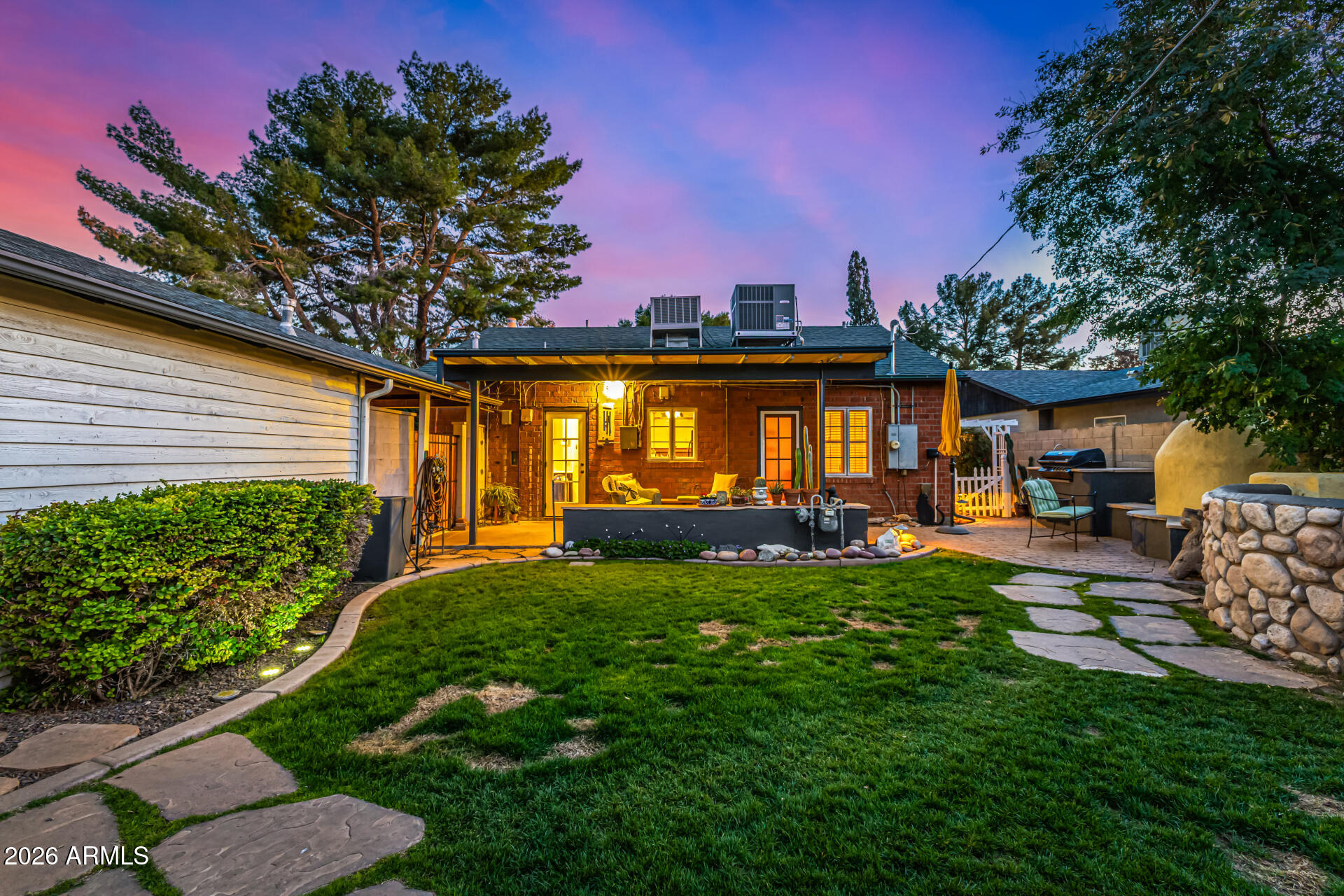 334 West Roma Avenue Phoenix, AZ 85013 - Photo 30 of 51 a view of a house with backyard porch and sitting area