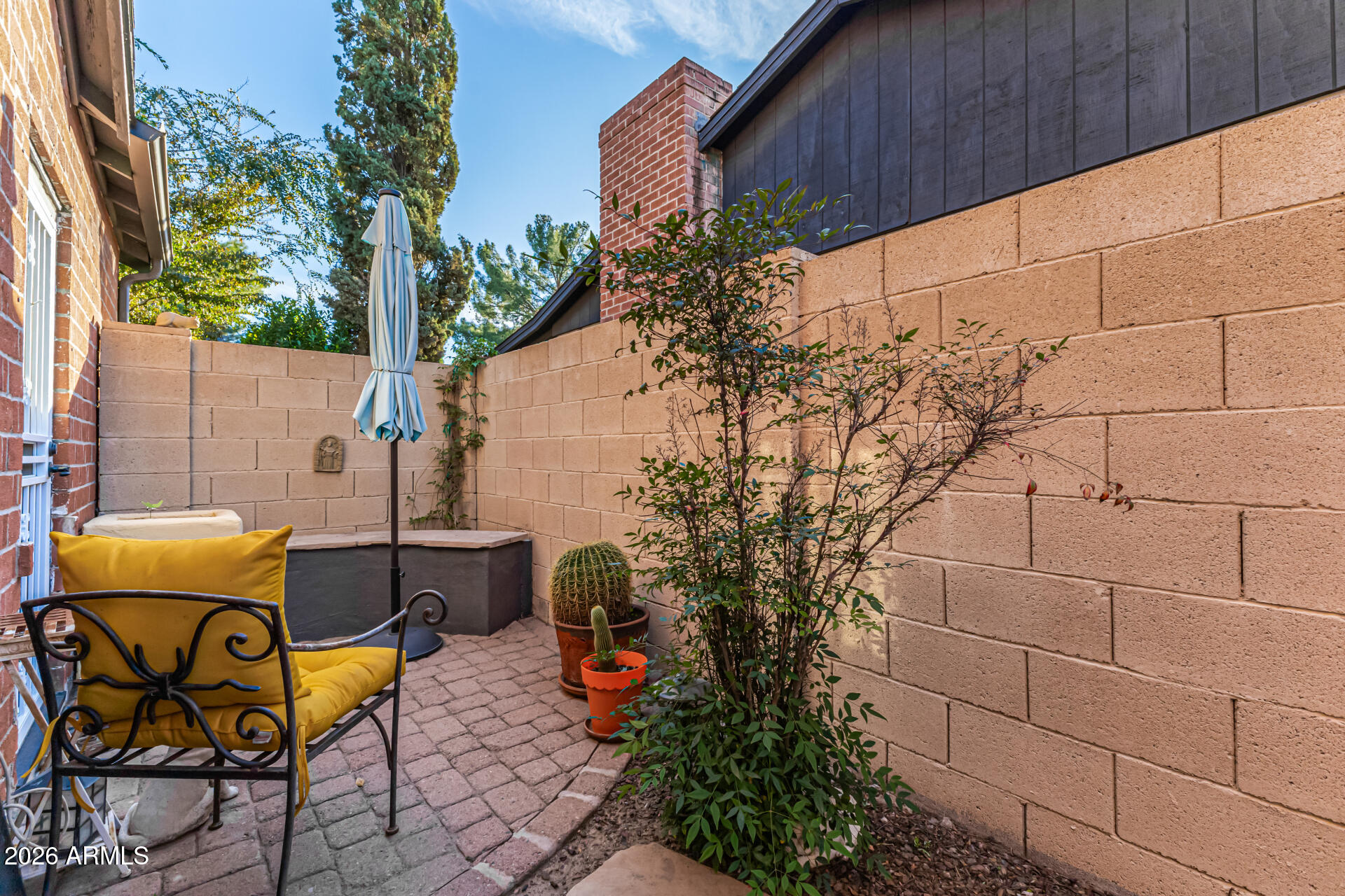 334 West Roma Avenue Phoenix, AZ 85013 - Photo 34 of 51 a view of a chairs and table in backyard