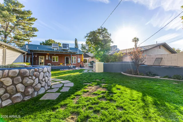 a view of a kitchen with a sink and a stove