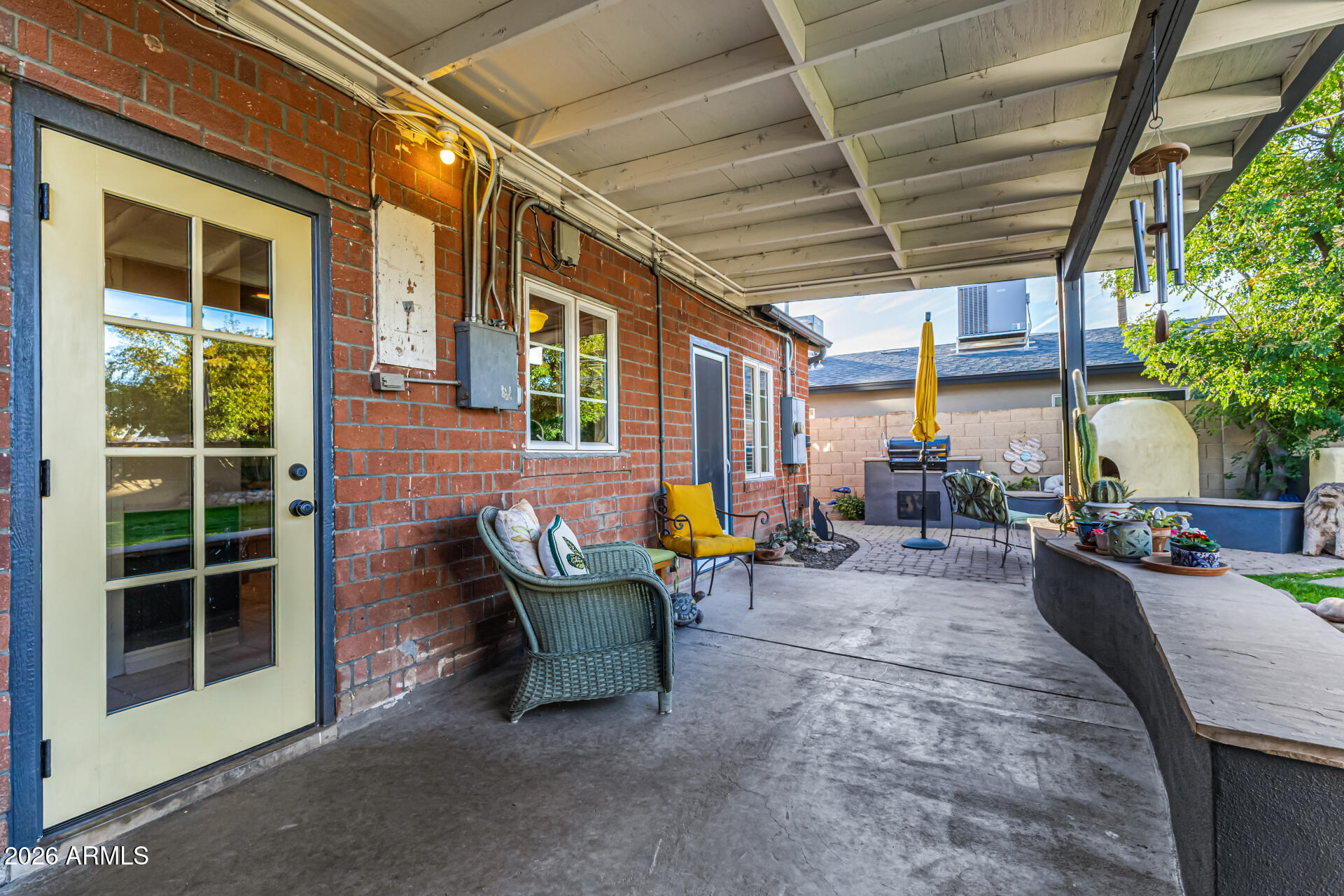 334 West Roma Avenue Phoenix, AZ 85013 - Photo 39 of 51 a building outdoor space with patio furniture and potted plants