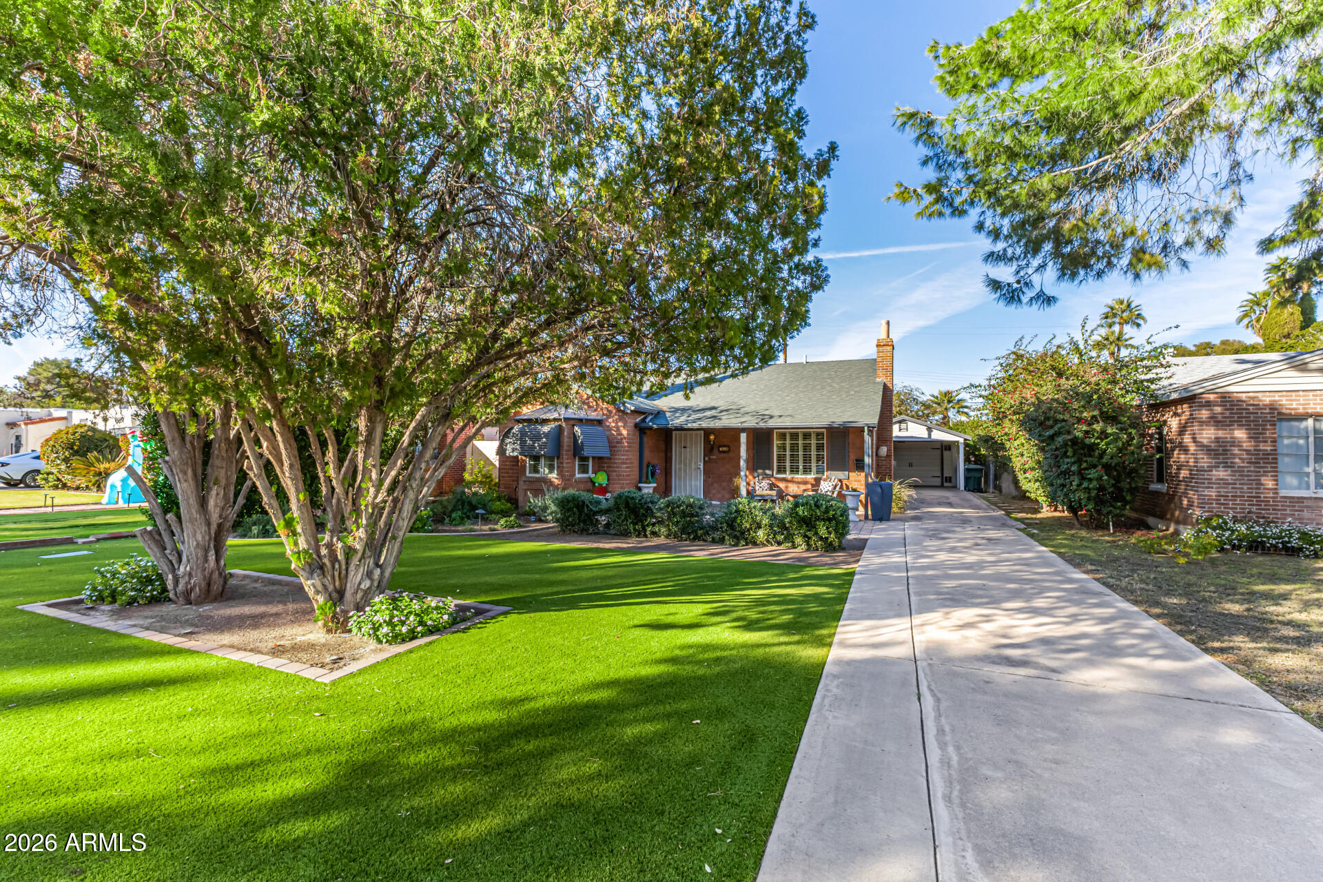 334 West Roma Avenue Phoenix, AZ 85013 - Photo 9 of 51 a front view of a house with a yard