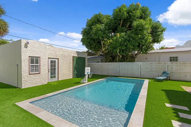 a view of a backyard with a garden