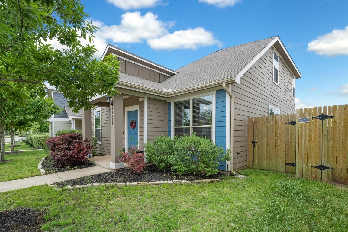 11713 Prado Ranch Boulevard Austin, TX 78725 - Photo 1 of 40 a view of backyard with a garden and plants