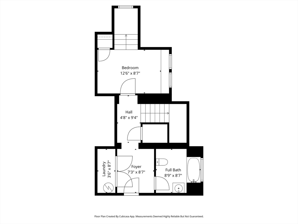 241 West 6th Street, Unit 102 Lowell, MA 01850 - Photo 21 of 25 a picture of a bench in front of a wall