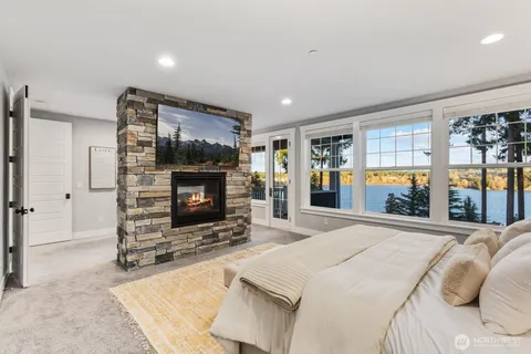 a living room with furniture and windows