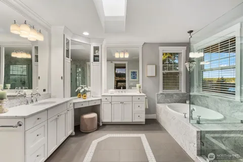 a bathroom with a shower and a tub