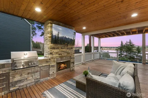 a room with furniture and a flat screen tv